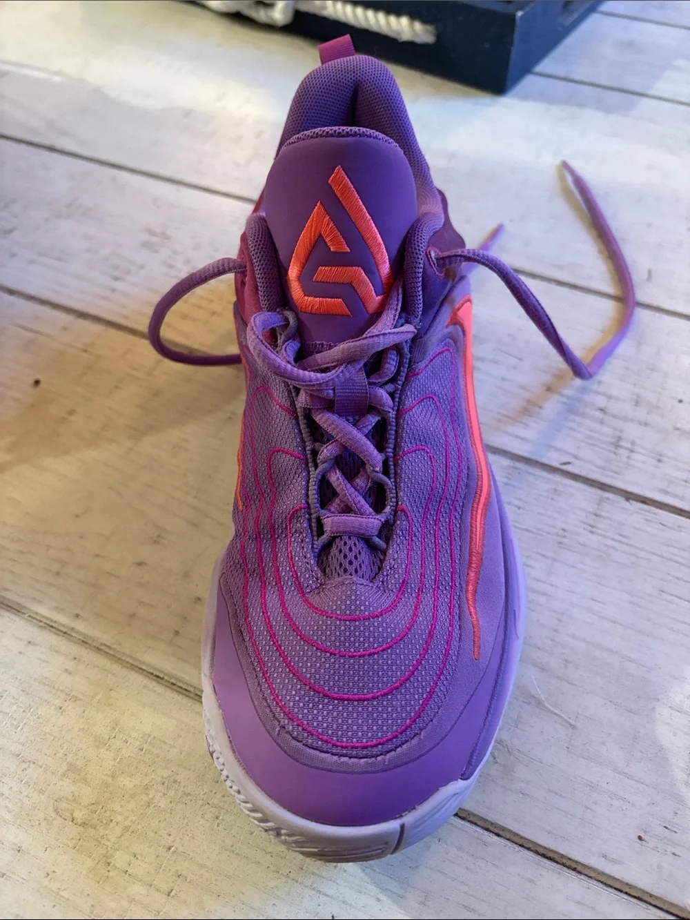 Nike Kids Purple Sneakers with Orange Swoosh